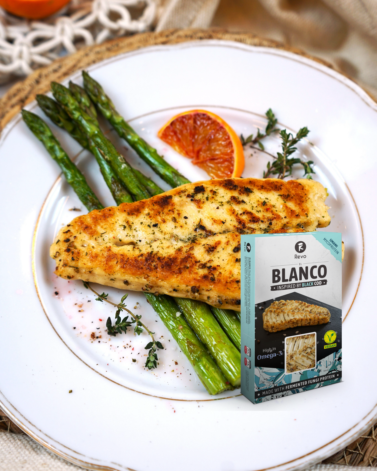 EL BLANCO vegan black cod alternative from mycoprotein, plated with asparagus
